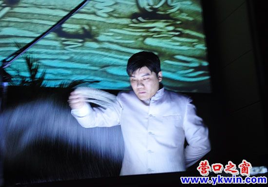 神奇沙畫成“書畫展”靚點