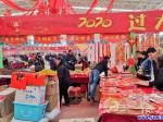 營口年味兒濃 集市上物品多